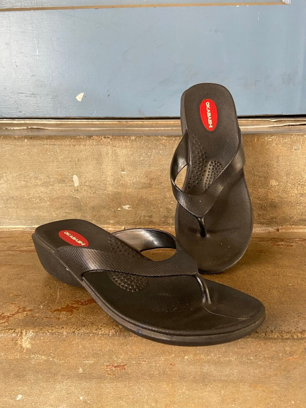 Okabashi black flip flop sandals in size Medium